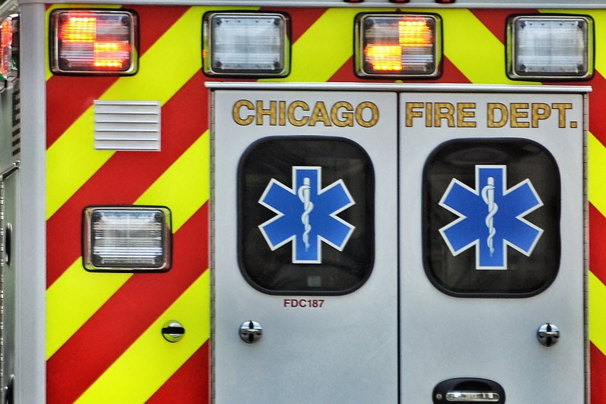 Photograph of the back end of a Chicago ambulance prominently featuring the rear doors.